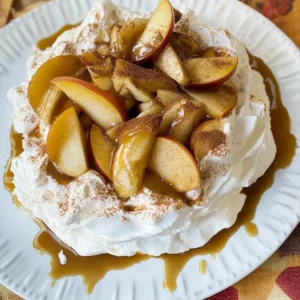 Fall Pavlova with Caramelized Apples and Cinnamon Whipped Cream